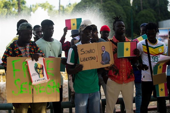 Archivo - June 7, 2023, Malaga, Spain: Protesters are seen holding placards and shouting slogans as they take part in a protest against the dictatorship of Senegal's current president, Macky Sall, at Plaza de la Marina square. The Senegalese community i