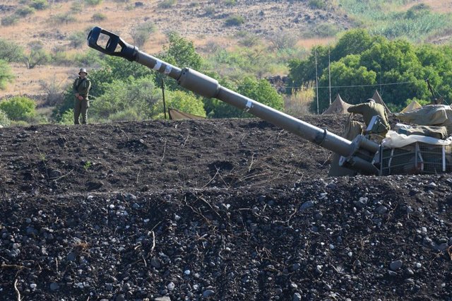 LEBANESE-ISRAELI BORDER, Oct. 18, 2023  -- Photo taken on Oct. 18, 2023 shows a position of a self-propelled howitzer deployed in northern Israel bordering Lebanon. Lebanon's Hezbollah said on Wednesday it has launched several attacks on Israeli targets w