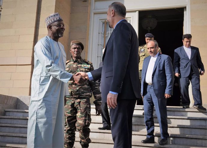 October 24, 2023, Tehran, Iran: Iranian Foreign Minister HOSSEIN AMIR ABDOLLAHIAN (C) welcomes Niger's BAKARY YAOU SANGARE (L), who was made foreign minister after the coup.