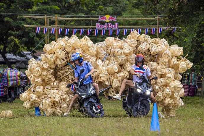 Marc and Alex Marquez race with bamboo baskets in Buriram, Thailand, on October 25, 2023