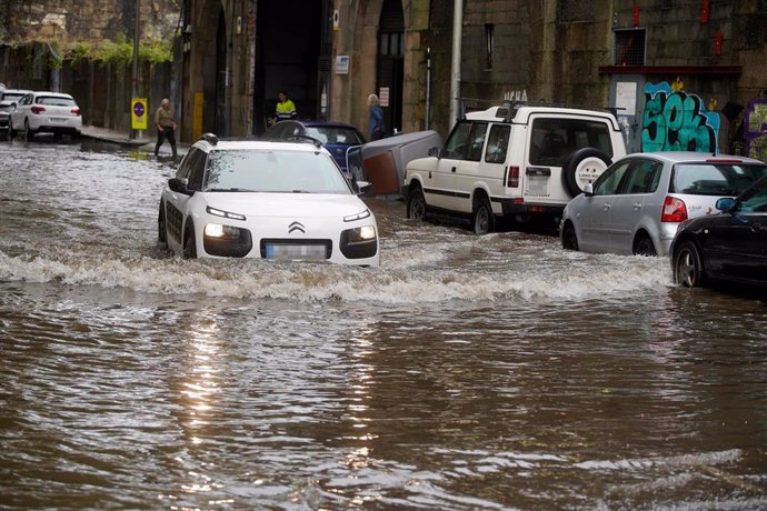 Imagen de archivo de la inundación de una carretera en Galicia.
