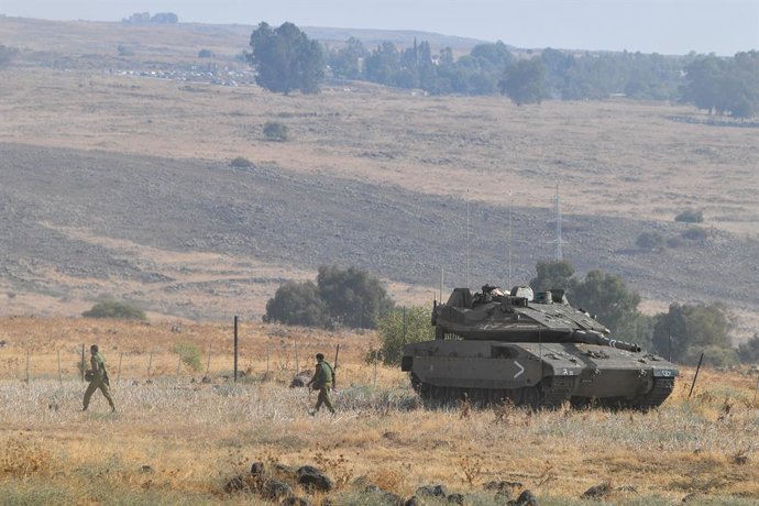 JERUSALEM, Oct. 8, 2023  -- This photo taken on Oct. 8, 2023 shows an Israeli tank in northern Israel near the border with Lebanon.   Dozens of rockets and heavy artillery shells were fired toward Israeli positions on the Shebaa Farms, a disputed strip 