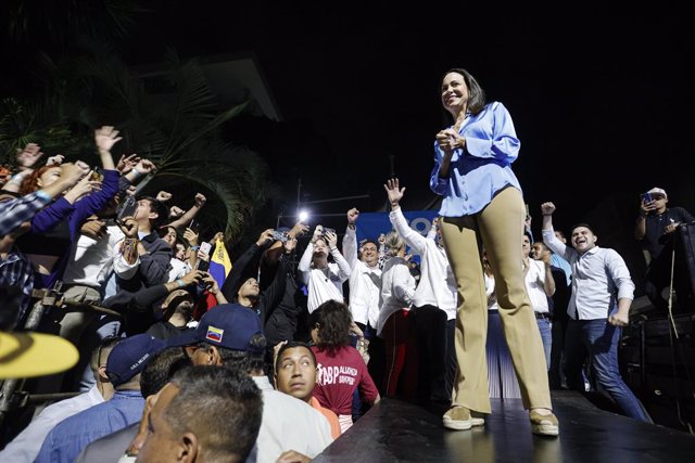 23 October 2023, Venezuela, Caracas: Maria Corina Machado, opposition presidential candidate, celebrates with her supporters after the announcement of the results confirming her victory in the opposition primaries. Photo: Jesus Vargas/dpa