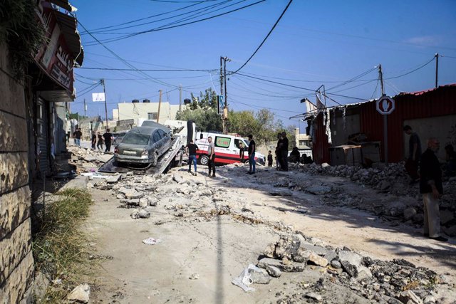 November 1, 2023, Jenin, West bank, Palestine: Palestinians inspect the damage of the buildings and streets following an Israeli military raid in a Jenin refugee camp in the occupied northern West Bank. According to health officials reports, 115 individua