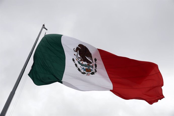 October 15, 2023, Mexico City, Mexico: Members of the Mexican Army lower the monumental flag of Mexico in the Zocalo during the XXIII Zocalo International Book Fair in Mexico City. on October 15, 2023 in Mexico City, Mexico