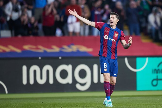 Robert Lewandowski of FC Barcelona reacts after scoring goal during the LaLiga EA Sports match between FC Barcelona and Deportivo Alaves at Estadi Olimpic Lluis Companys on November 12, 2023, in Barcelona, Spain.