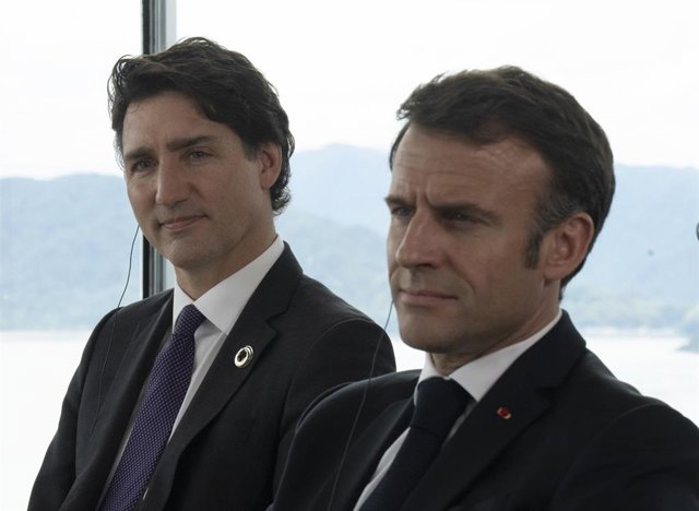 Archivo - El primer ministro de Canadá, Justin Trudeau, y el presidente de Francia, Emmanuel Macron