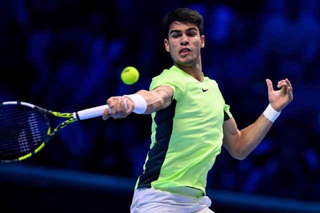13 November 2023, Italy, Turin: Spanish tennis player Carlos Alcaraz in action against German Alexander Zverev during their men's singles group stage match of the 2023 ATP Finals tennis tournament. Photo: Marco Alpozzi/LaPresse via ZUMA Press/dpa