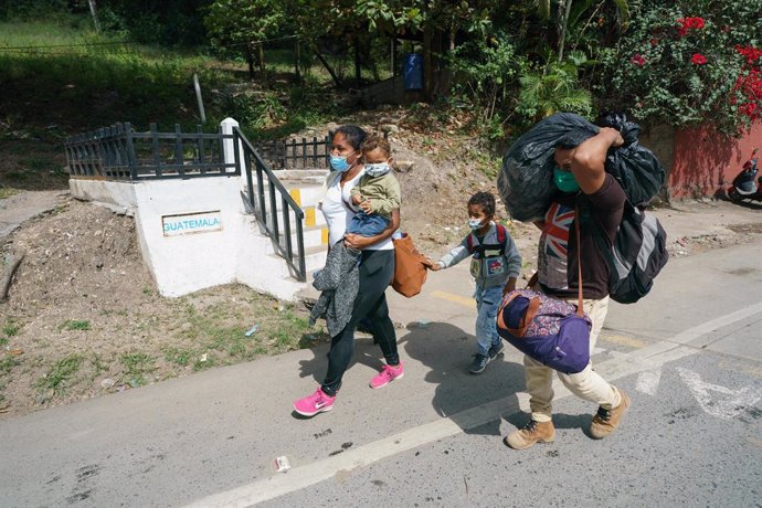 Archivo - January 19, 2021, El Florido, Honduras: At the Honduras-Guatemala border crossing in El Florido today meeting with people deported from Guatemala after heading north last week as part of a 6,000 person strong migrant caravan. Over 1,000 migran