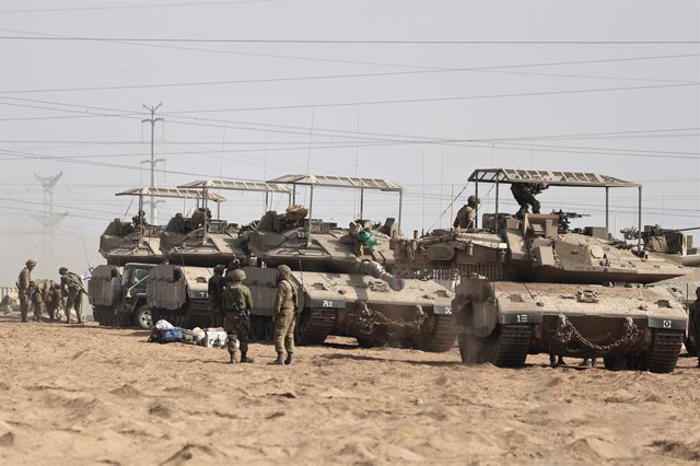 SDEROT, Oct. 24, 2023  -- This photo taken on Oct. 23, 2023 shows Israeli soldiers and military vehicles near the Israel-Gaza border in Israel.