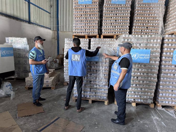 November 4, 2023, Dair El-Balah, Gaza Strip, Palestinian Territory: Workers of the United Nations Relief and Works Agency for Palestine Refugees (UNRWA) pack the medical aid and prepare it for distribution to Shelter centers at a warehouse in Deir Al-Bala