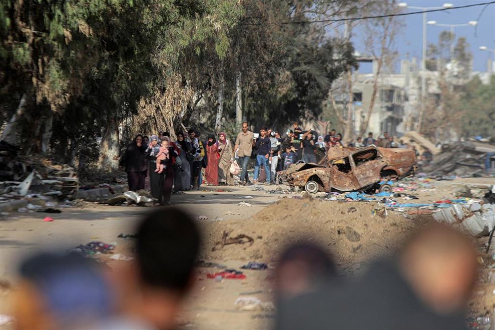 GAZA, Nov. 19, 2023 -- Palestinian people are seen on their way from Gaza City toward south, in southern Gaza Strip, on Nov. 18, 2023. The Israel Defense Forces (IDF) announced Saturday that it has expanded the offensive against Hamas in the Palestin