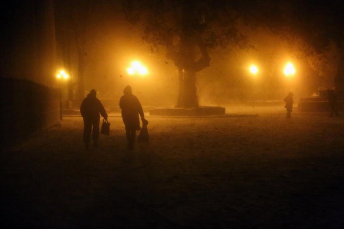 November 26, 2023, Odessa, Ukraine: People are seen walking in a strong snowstorm on Dumskaya Square. Odessa weather forecasters believe that the current snowfall has become the heaviest in the last five years and has surpassed the scale of the blizzard