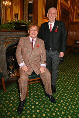 LONDON, ENGLAND - NOVEMBER 29: Sir Elton John and Sir Lindsay Hoyle, Speaker of the House of Commons, attend a reception honouring Sir Elton John hosted by the All Party Parliamentary Group on HIV/AIDS at Speakers House in recognition of his enduring co