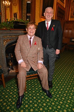 LONDON, ENGLAND - NOVEMBER 29: Sir Elton John and Sir Lindsay Hoyle, Speaker of the House of Commons, attend a reception honouring Sir Elton John hosted by the All Party Parliamentary Group on HIV/AIDS at Speakers House in recognition of his enduring comm