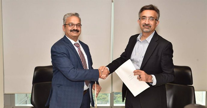 (L-R) Rohit Mathur, SVP & SBU Head - HR And Payroll, Ramco Systems, And Gokul Chaudhri, President, Tax, Deloitte Touche Tohmatsu India LLP, During The Signing Ceremony At The Deloitte Office In Bengaluru, India