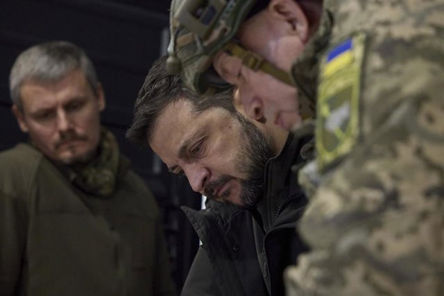 November 30, 2023, Kupyansk, Kharkiv region, Ukraine: Ukrainian President Volodymyr Zelenskyy, center, is briefed on the situation along the Kupyansk â€“ Lyman defensive line during a visit to a frontline command post in the Kharkiv region, November 30, 2