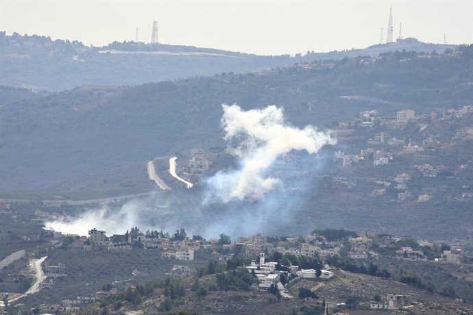 KAFR KILA (LEBANON), Nov. 22, 2023  -- Photo taken on Nov. 22, 2023 shows smoke rising following Israeli artillery shelling in the Lebanese border of Kafr Kila. The Israel-Lebanon border has been witnessing increased tension for over six weeks since Leban
