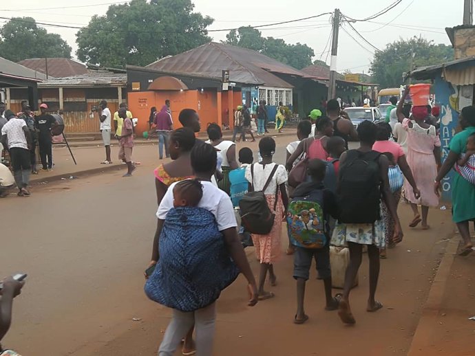 BISSAU, Dec. 1, 2023  -- People are seen on a street in Bissau, Guinea-Bissau, Dec. 1, 2023.   Gunshots were heard overnight in Guinea-Bissau's capital, Bissau, till Friday morning, Xinhua reporters there said.   On Feb. 1, 2022, some members of the Gui