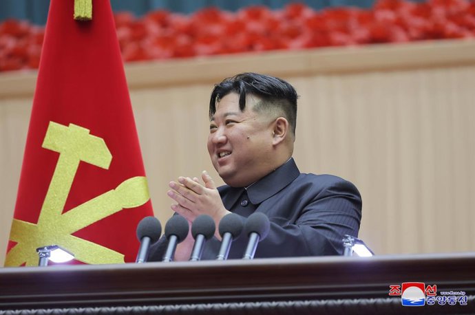 HANDOUT - 04 December 2023, North Korea, Pyongyang: A picture released by the North Korean state news agency (KCNA) on 3 December 2023 shows the North Korean leader Kim Jong-un speaking during the fifth national meeting of mothers. Photo: -/kcna/dpa - A
