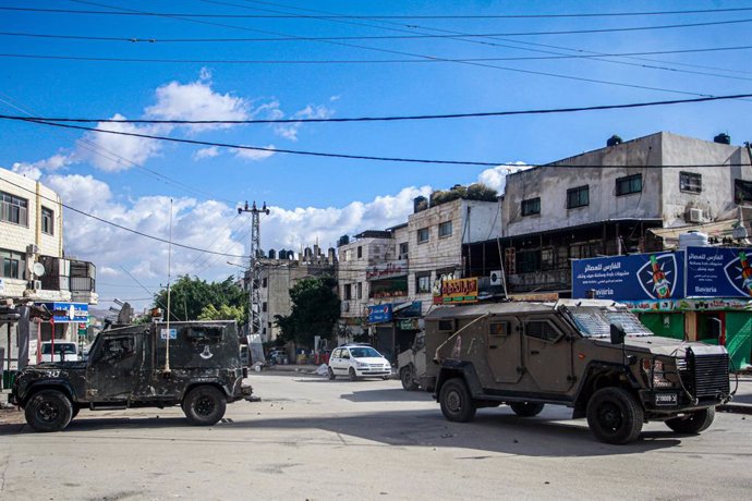 November 21, 2023, Nablus, Palestine: Israeli army forces surround Balata refugee camp during a raid to arrest wanted Palestinians, east of Nablus in the northern West Bank.