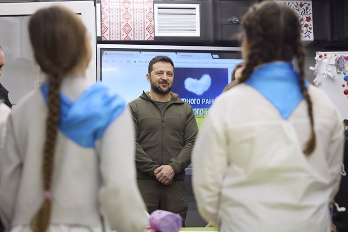 November 30, 2023, Kharkiv, Kharkiv region, Ukraine: Ukrainian President Volodymyr Zelenskyy, center, speaks with school children during a visit to the Universytet metro station classrooms, November 30, 2023 in Kharkiv, Kharkiv region, Ukraine.