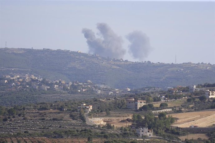 AL-QUAZAH, Dec. 4, 2023  -- Smoke rises following an Israeli strike in Al-Quazah, Lebanon, on Dec. 4, 2023. Six Lebanese civilians were injured on Monday in Israeli artillery and missile shelling targeting several border areas in southern Lebanon, Leban