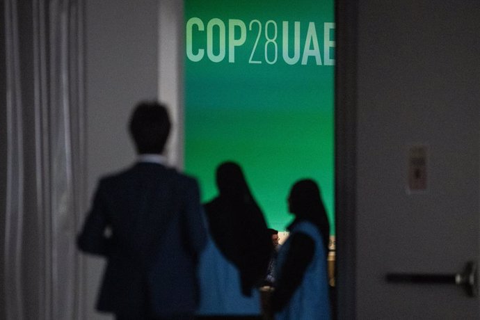 11 December 2023, United Arab Emirates, Dubai: View through a door into a meeting room on the grounds of the UN Climate Change Conference COP28. Photo: Hannes P. Albert/dpa