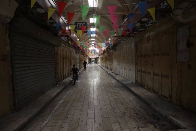 NABLUS, Dec. 11, 2023  -- Photo taken on Dec. 11, 2023 shows closed stores in the West Bank city of Nablus. A comprehensive strike in the West Bank and east Jerusalem in protest of Israel's ongoing offensive in the Gaza Strip paralyzed all aspects of life