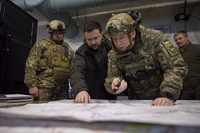 November 30, 2023, Kupyansk, Kharkiv region, Ukraine: Ukrainian President Volodymyr Zelenskyy, center, is briefed on the situation along the Kupyansk â€“ Lyman defensive line during a visit to a frontline command post in the Kharkiv region, November 30, 2