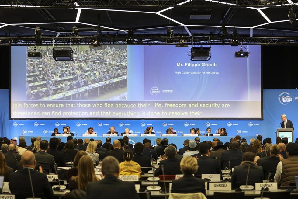 Leaders attending the Global Refugee Forum 2023 gather for the events opening plenary session.