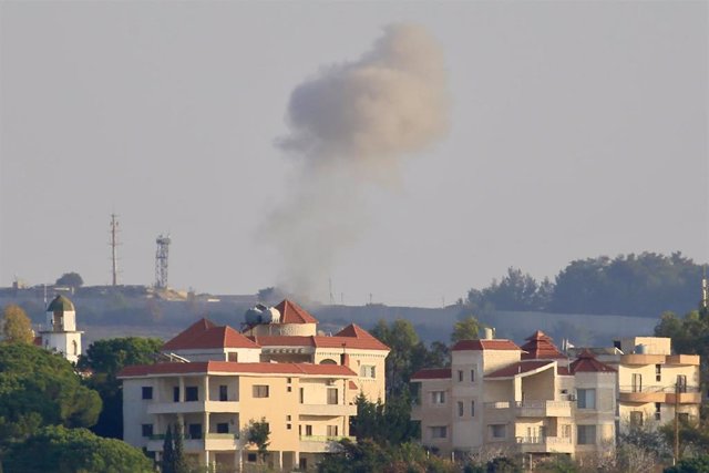 CHAMA, Dec. 4, 2023  -- Photo taken on Dec. 4, 2023 from Chama, Lebanon, shows smoke rising from an Israeli border post following a Hezbollah's rocket attack. Hezbollah, a Shiite military group, said on Monday its fighters attacked Israeli positions in th