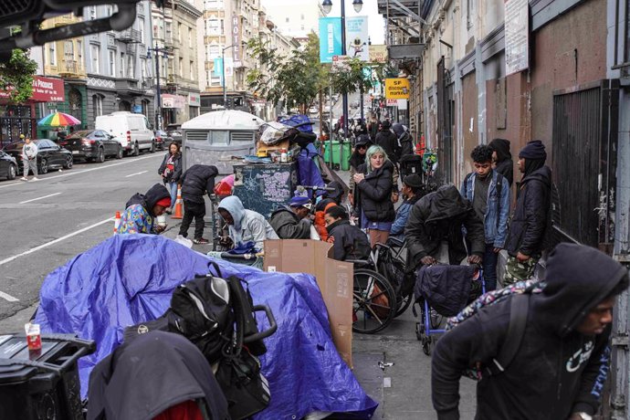 December 1, 2023, San Francisco, California, United States: Homeless people gather next to their tents on the street. The issue of homelessness remains a significant concern in San Francisco, California, with thousands of individuals living on the streets