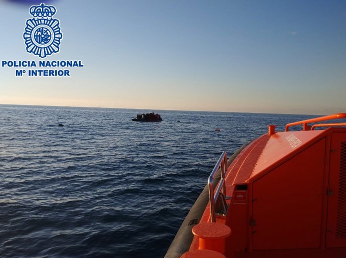 Archivo - Nota De Prensa "La Policía Nacional Detiene En Málaga A Dos Hombres, Conductor Y Copiloto De Una Patera Con 46 Personas A Bordo, Por Favorecimiento De La Inmigración Ilegal"