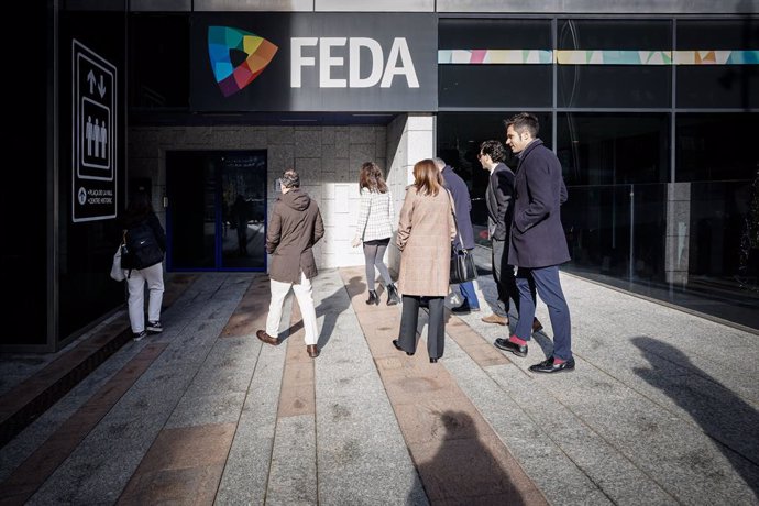 Membres del Govern entrant en les installacions de FEDA per a la visita de Nadal.