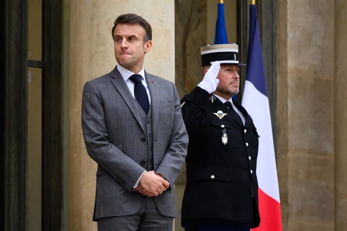 December 13, 2023, Paris, Ile-de-France (region, France: French President Emmanuel Macron on the steps of the Palais de l'Elysee, December 13, 2023.