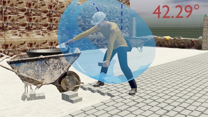 Simulación del puesto de adoquinado con envolventes del alcance de la persona trabajadora y ángulo de flexión del torso.