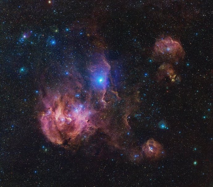 The Running Chicken Nebula comprises several clouds, all of which we can see in this vast image from the VLT Survey Telescope (VST), hosted at ESOs Paranal site.