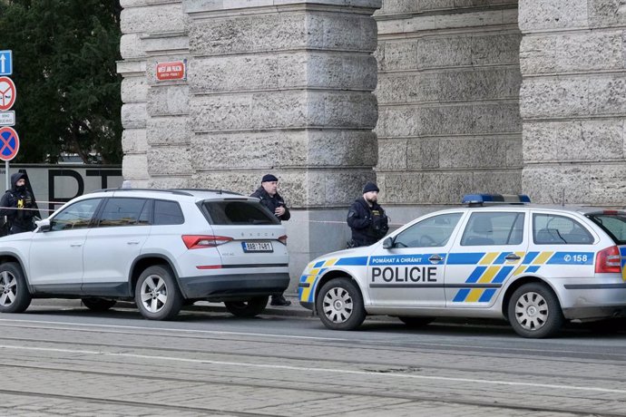 PRAGUE, Dec. 22, 2023  -- Police officers are seen outside the building of the Faculty of Arts of Charles University in Prague, the Czech Republic, Dec. 22, 2023. Czech Prime Minister Petr Fiala announced on Thursday that the government has designated Dec