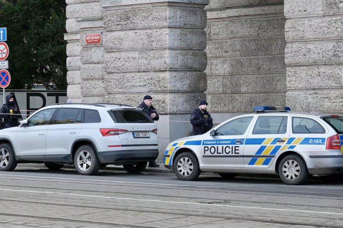 PRAGUE, Dec. 22, 2023  -- Police officers are seen outside the building of the Faculty of Arts of Charles University in Prague, the Czech Republic, Dec. 22, 2023. Czech Prime Minister Petr Fiala announced on Thursday that the government has designated D