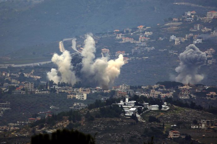 KFAR KILA, Dec. 21, 2023  -- Smoke rises following an Israeli airstrike in Kfar Kila, Lebanon, on Dec. 21, 2023. Two Hezbollah members and a civilian were killed, while two other civilians were wounded in Israeli attacks on Thursday in southern Lebanon,