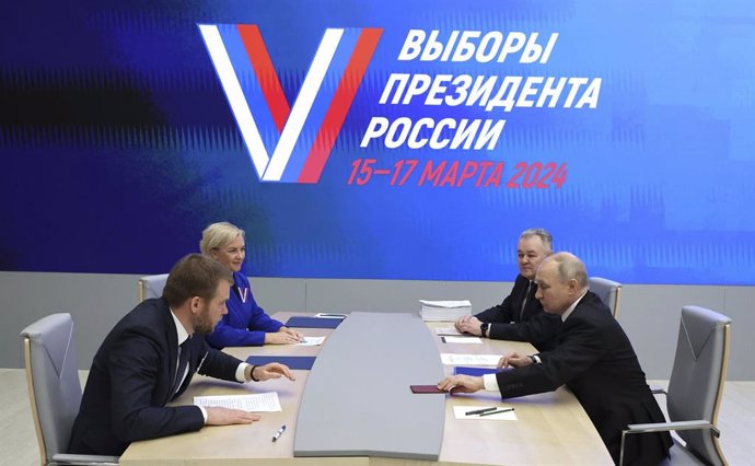 December 18, 2023, Moscow, Moscow Oblast, Russia: Russian President Vladimir Putin, right, submits his documents to be registered as a candidate in the upcoming 2024 Russian presidential election at the Central Election Commission, December 18, 2023 in Mo