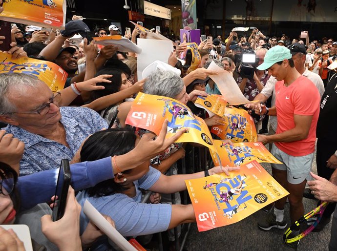 Rafael Nadal of Spain is seen with fans in the Queen Street Mall in Brisbane, Friday, December 29, 2023. Rafael Nadal will be playing in the Brisbane International tennis tournament after taking a long break from tennis due to an injury.(AAP Image/Darren 
