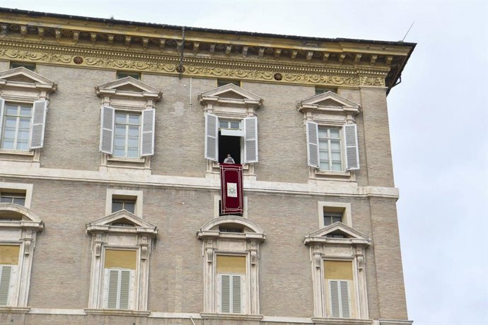 January 1, 2024, Vatican City, Vatican City: A handout picture, provided by Vatican Media Press Office, shows Pope Francis leading the Angelus prayer from the window of the apostolic palace overlooking St. Peter's Square, in Vatican City, 01 January 202
