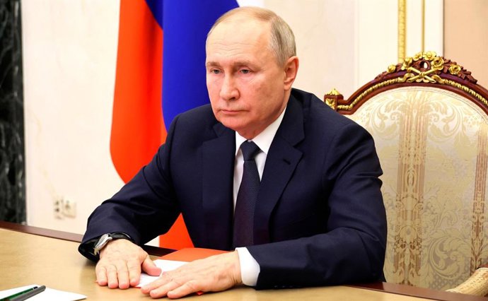 HANDOUT - 22 December 2023, Russia, Moscow: Russian President Vladimir Putin chairs a Security Council meeting via a video conference. Photo: -/Kremlin/dpa - ATTENTION: editorial use only and only if the credit mentioned above is referenced in full