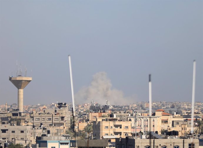 KHAN YOUNIS, Jan. 13, 2024  -- Smoke rises following an Israeli airstrike in the southern Gaza Strip city of Khan Younis, Jan. 13, 2024. According to statistics issued by the Gaza-based Health Ministry on Saturday, the Israeli attacks on the Gaza Strip ki