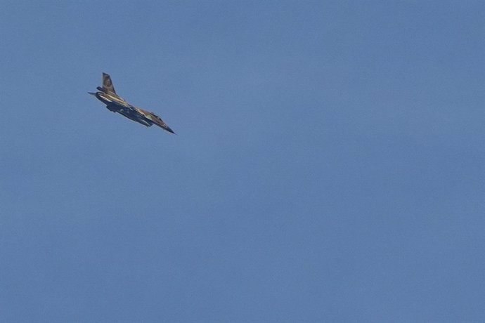 KIRYAT SHMONA, Jan. 9, 2024  -- A fighter jet of Israel Defense Forces (IDF) is seen in the sky of northern Israel, near the border with Lebanon, Jan. 8, 2024. Israeli Foreign Minister Israel Katz confirmed on Monday evening that Israel was behind the ass