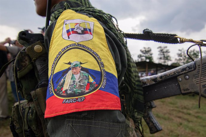 Archivo - April 15, 2023, San Vicente del Caguan, Caqueta, Colombia: A member of the FARC-EP guerrilla during the announcement by the FARC's Central General Staff (EMC) to open peace talks with the Colombian government during an assembly in San Vicente de