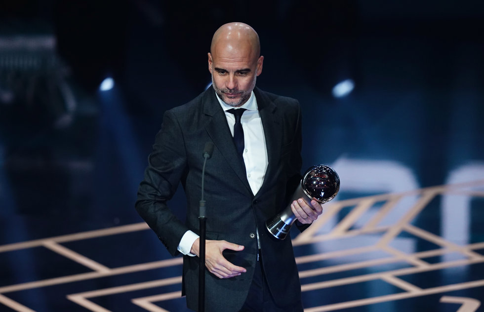 15 January 2024, United Kingdom, London: Manchester City manager Pep Guardiola speaks after receiving the award for The Best FIFA Men's Coach on stage during The Best FIFA Football Awards at the Eventim Apollo. Photo: John Walton/PA Wire/dpa