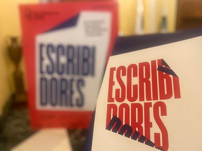 Cartel de 'Escribidores'.
